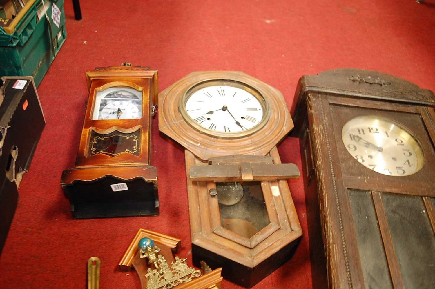 A 1930s oak cased wall clock; together with a droptrunk wall clock; and two others (4) - Image 3 of 3