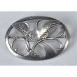 Arno Malinowski for Georg Jensen - a sterling silver oval brooch, the pierced decoration with exotic