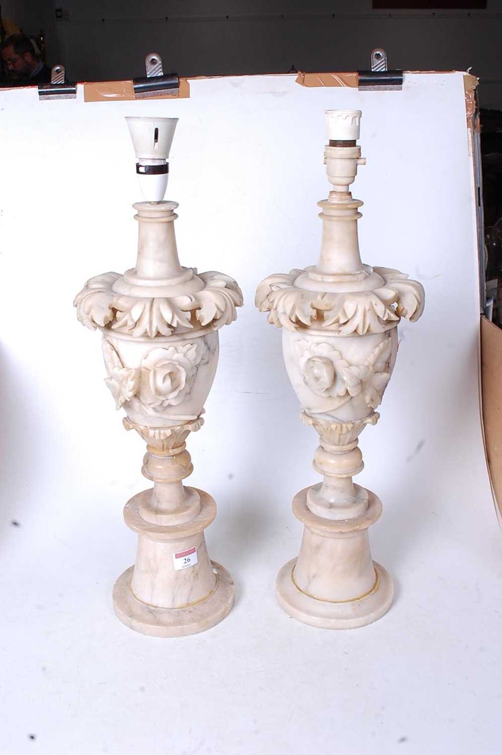 A pair of early 20th century onyx table lamps, each of urn shape with applied floral decoration, h. - Image 2 of 2