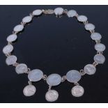 A white metal coin bracelet made up of early 20th century Indian rupees, 40cm