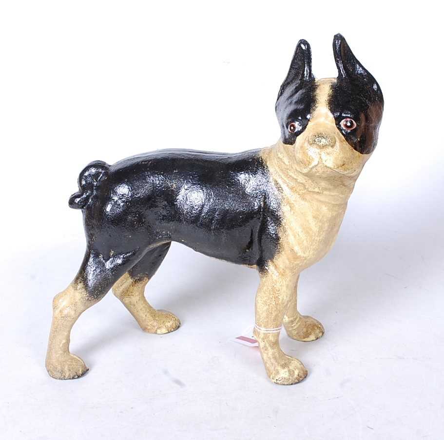 A painted cast metal doorstop in the form of a bulldog, h.24cm
