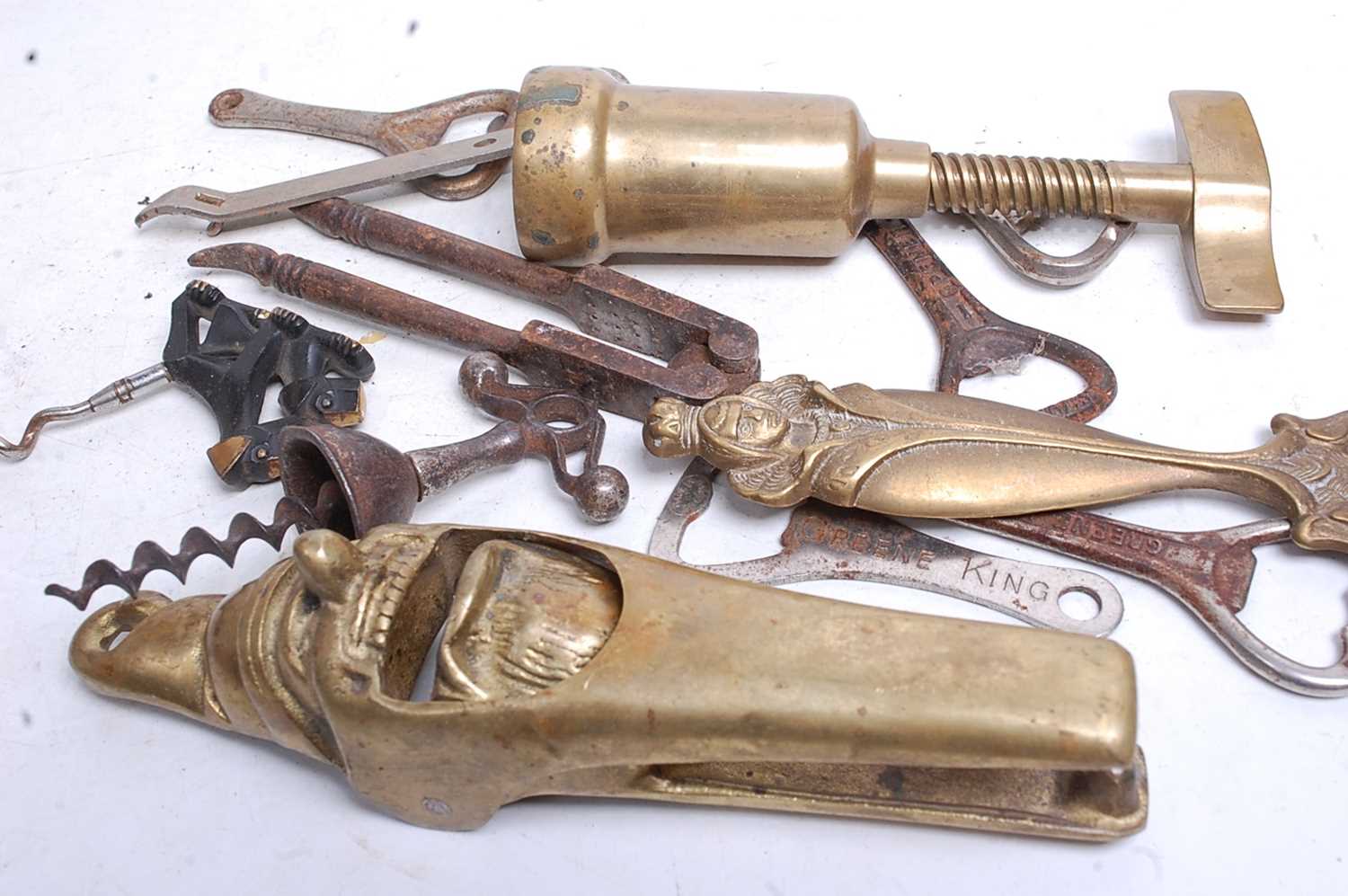 A collection of miscellaneous items to include brass barrel corkscrew, various other corkscrews,