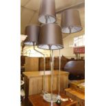 A contemporary chromed metal five branch table light of good size with original shades