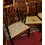 A set of six 19th century mahogany Chippendale style dining chairs, each having floral needlework