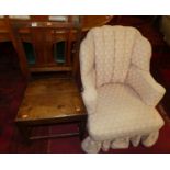 An Edwardian later upholstered cloud shaped nursing tub elbow chair, width 67cm, together with a