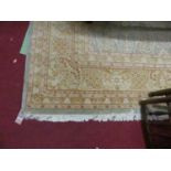 A large Persian style pale blue ground Tabriz carpet, the intricate floral stylised ground within