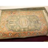 A Belgian Osta Carpets Kabir small woollen rug, 60 x 95cm, together with a Persian woollen green