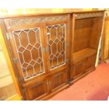 A contemporary Old Charm linenfold moulded oak lead glazed bookcase, width 96cm, together with