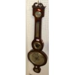 A 19th century rosewood four-dial wheel barometer, the lower scale titled Warrented Correct, h.97cm