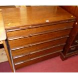 A 1970s teak chest of five long drawers, having slightly proud integral baton handles, width 82cm