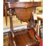 A mid-Victorian figured walnut and floral satinwood inlaid hinge top sewing table, having shaped top