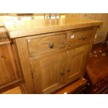 A contemporary light oak double door side cupboard with twin upper drawers, width 84cm