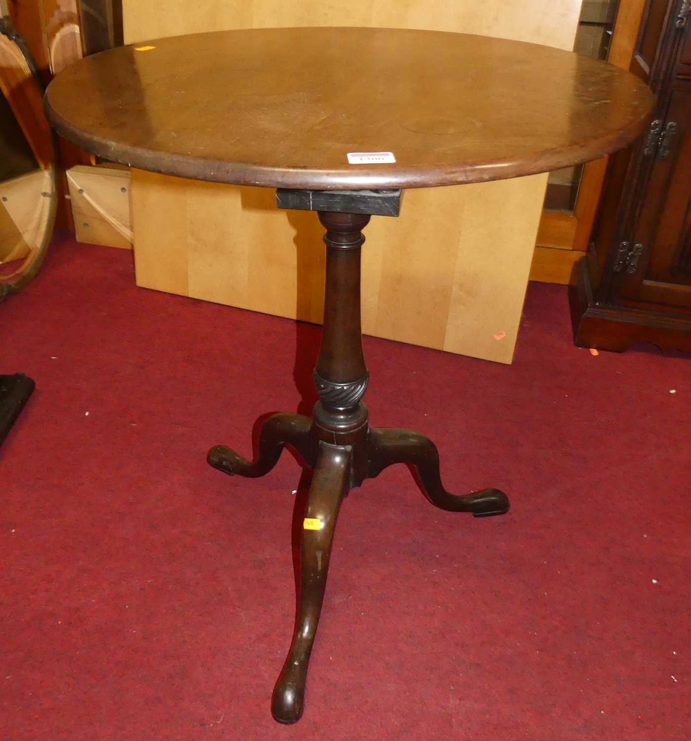 A 19th century mahogany circular tilt-top pedestal tripod table, having birdcage undertier, dia.