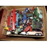 A box of various plastic vintage model vehicles (mostly playworn)
