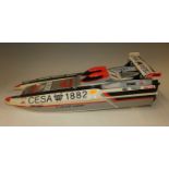 Three various remote controlled model speedboats,