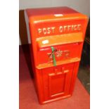 A painted metal post box