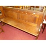 A late Victorian pitched pine four seater church pew, width 160cm