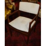 A set of eight 1960s teak dining chairs, having reupholstered fixed pad back and seats (6+2)