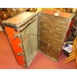 An early 20th century painted metal compactum travelling trunk, the interior fitted with railed