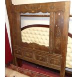 A mahogany and floral buttoned, padded and upholstered super-kingsize headboard; together with a