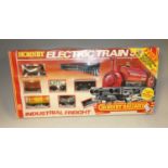 Two boxed Hornby sets, being Industrial Freight and Advanced Passenger train set, and two tunnels (