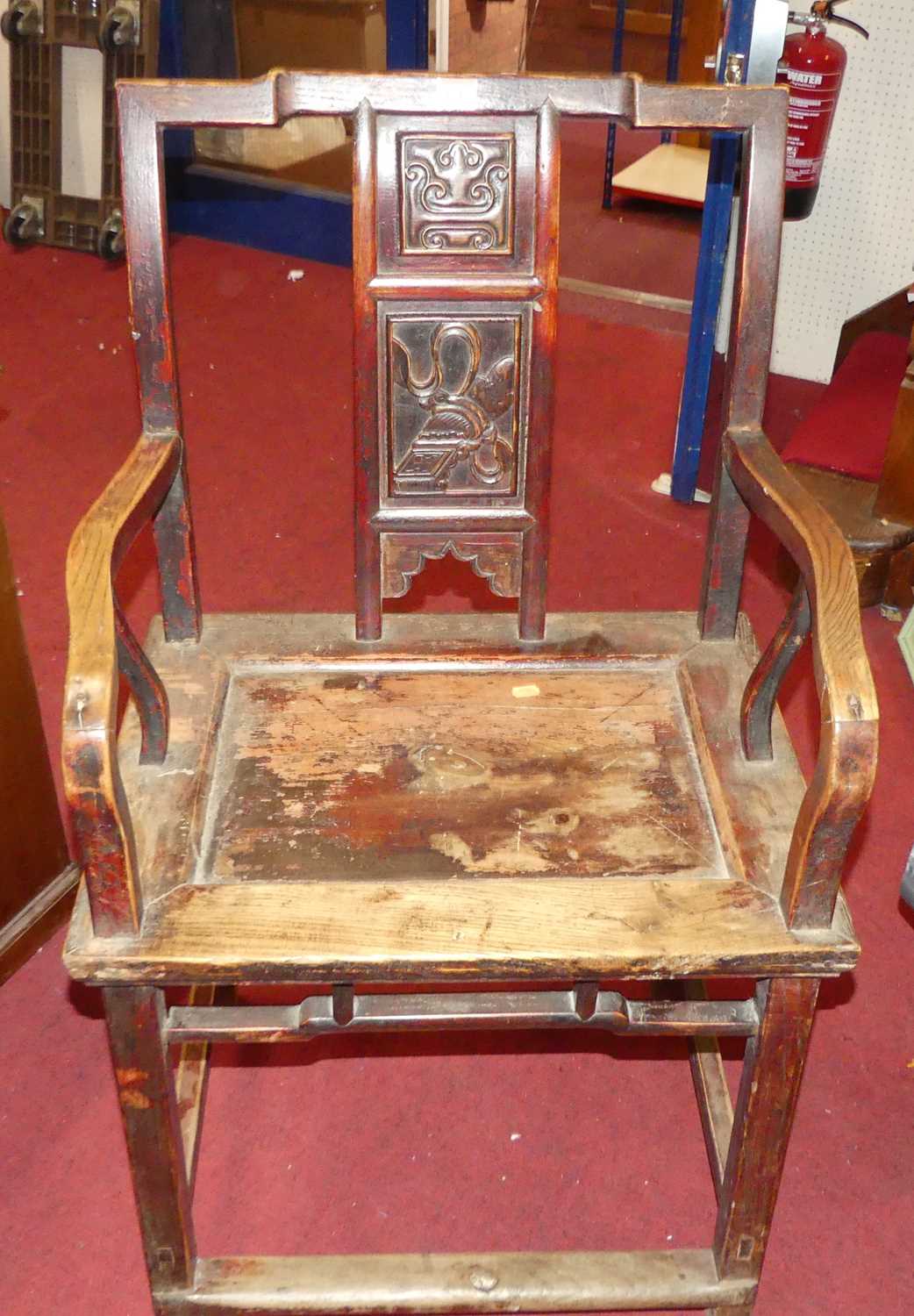 An early 20th century Chinese stained elm panelled seat splatback single elbow chair, width 58cm