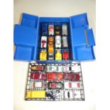 A Matchbox blue plastic carrycase, containing 24 used Matchbox models