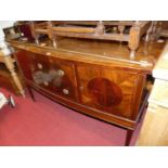 An Edwardian mahogany cross banded and further satinwood strung bow front sideboard, having twin