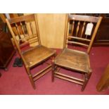 A pair of 19th century provincial elm panelled seat North Country dining chairs