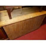 A large rustic planked pine hinge top blanket chest, width 132cm