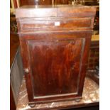 An early 19th century mahogany gentleman's night commode, having twin fold over top and single