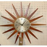 A 1970s Newgate sunburst circular wall clock, battery operated, overall dia. 54cm