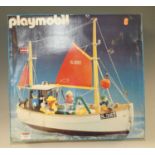 A Playmobil boxed ships set, with further car, speedboat and other items