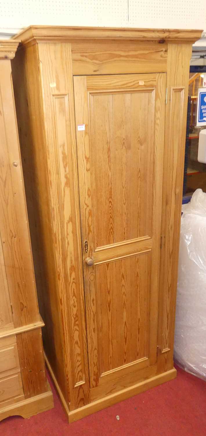 A modern pine single door wardrobe, w.76cm