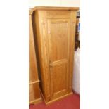 A modern pine single door wardrobe, w.76cm