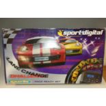Two boxed Scalextric sets, to include Le Mans 24-hour set and Lane Change Challenge set, both appear