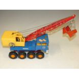 A plastic model unboxed Gama crane grab lorry, in blue, yellow and red, good condition