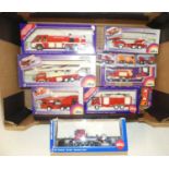 One box of eleven Siku boxed model fire engines