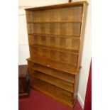 A contemporary oak freestanding open two tier bookshelf, width 127cm