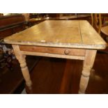 A Victorian pine plank top farmhouse kitchen table, having single end drawer and raised on turned