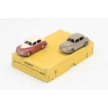 Dinky Toys 40g original Trade box containing 2 Morris Oxford saloons, one in fawn with brown hubs