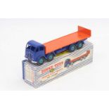 A Dinky Toys No. 903 Foden flat truck with tailboard comprising of a 2nd type dark blue cab and