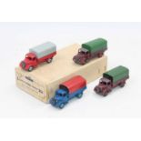 Dinky Toys 30s original Trade box containing 4 Austin Wagons, in various colours with various