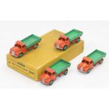 Dinky Toys 30m original Trade box containing 4 Rear tipping wagons, in orange with green tipper