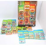 One tray containing 60+ Dinky / Airfix (made in Hong Kong), Matchbox size models on sealed cards,