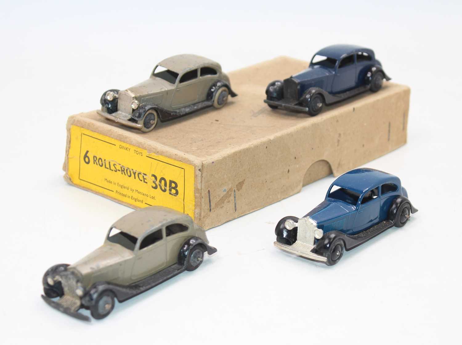 Dinky toys no.30b Rolls-Royce" saloon Trade box of 4 with 3 original models with age-wear and one