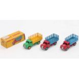 Dinky Toys 343 group of 3 "Farm Produce wagons" 2 in red and blue and 1 in green and yellow all