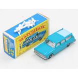 A boxed Matchbox no.42 Studebaker Station wagon in dark blue with light blue metal slide roof,(one