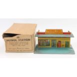 A Dinky Toys No. 48 pre-war filling and service station with sea green/blue roof and yellow body all