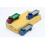 Dinky Toys 30m original Trade box containing 3 Rear tipping wagons, 2 in blue and grey, one in